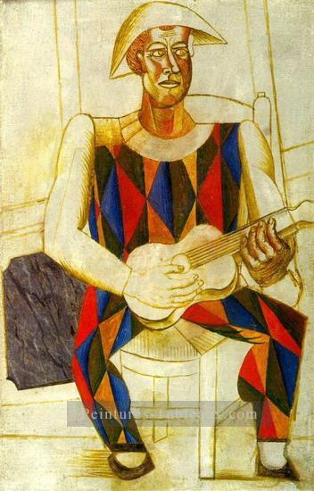 Arlequin assis a la guitare 1916 cubiste Pablo Picasso Peintures à l'huile